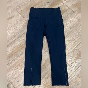 Lululemon fast and free high rise 19” crop pant. Navy size 4